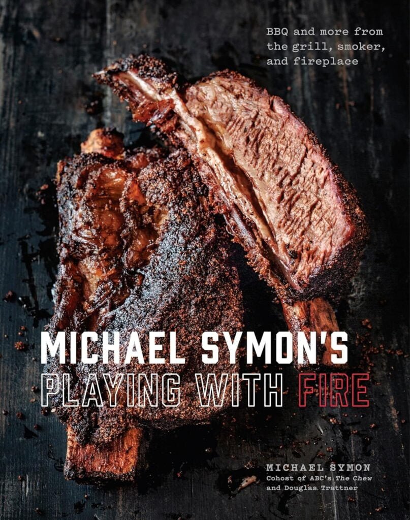 Michael Symons Playing with Fire: BBQ and More from the Grill, Smoker, and Fireplace: A Cookbook     Hardcover – April 3, 2018