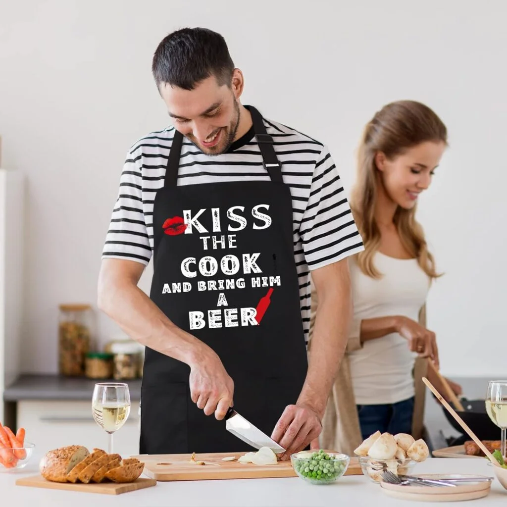 BBQ Funny Apron for Men, Chef Bib Apron with 2 Pockets, Adjustable Neck Strap and 40 Long Ties - Best for Kitchen Cooking, Grilling, Baking, Gardening - Black BBQ Funny Apron for Men, Chef Bib Apron with 2 Pockets, Adjustable Neck Strap and 40 Long Ties - Best for Kitchen Cooking, Grilling, Baking, Gardening - Black